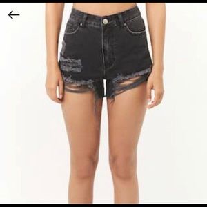 Black distressed shorts